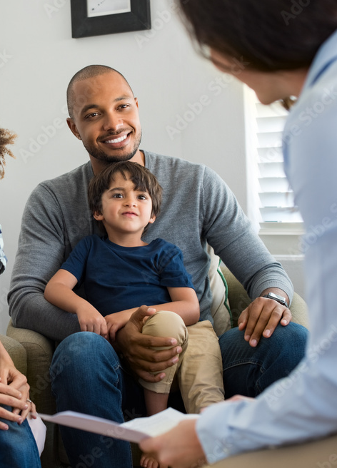 A man and child with a counsellor